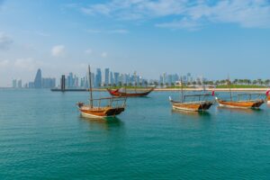Traditional,Dhows,With,Skyline,Of,Doha,In,Qatar.