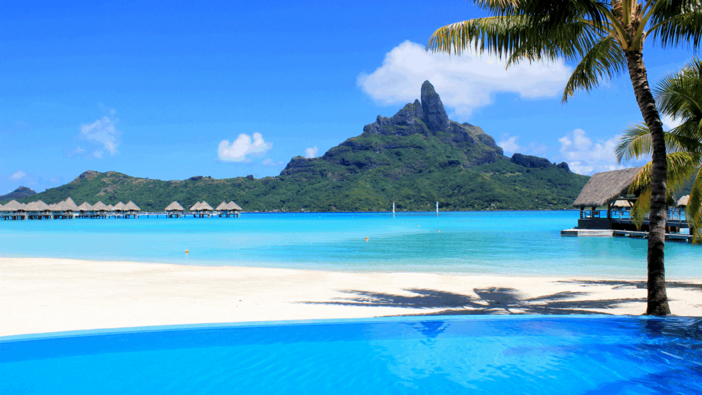 Pool, lagoon and mountain in French Polynesia